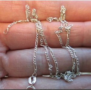 Sold. 14k white gold Figaro chain necklace